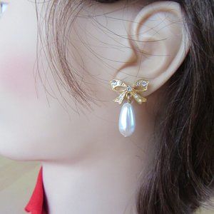 Rhinestone bow & pearl drop pierced earrings